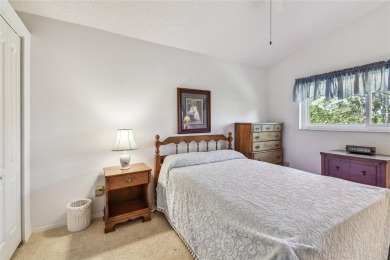 Stunning End-Unit Condo with Pond Views in a Vibrant 55+ on On Top Of The World Golf Course in Florida - for sale on GolfHomes.com, golf home, golf lot