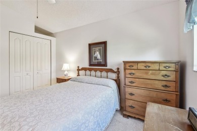 Stunning End-Unit Condo with Pond Views in a Vibrant 55+ on On Top Of The World Golf Course in Florida - for sale on GolfHomes.com, golf home, golf lot