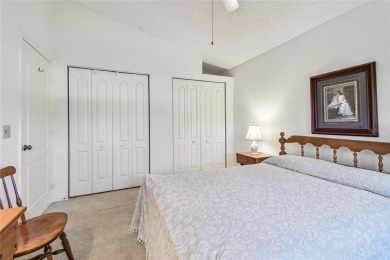 Stunning End-Unit Condo with Pond Views in a Vibrant 55+ on On Top Of The World Golf Course in Florida - for sale on GolfHomes.com, golf home, golf lot