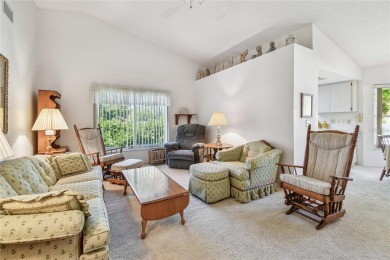Stunning End-Unit Condo with Pond Views in a Vibrant 55+ on On Top Of The World Golf Course in Florida - for sale on GolfHomes.com, golf home, golf lot
