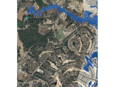 This 0.48-acre lot sits at the end of a cul-de-sac in The on River Landing Golf Course in North Carolina - for sale on GolfHomes.com, golf home, golf lot