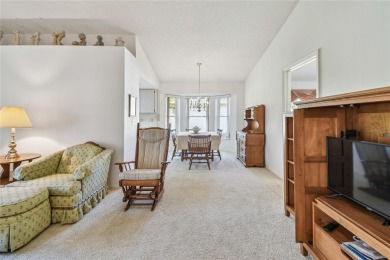 Stunning End-Unit Condo with Pond Views in a Vibrant 55+ on On Top Of The World Golf Course in Florida - for sale on GolfHomes.com, golf home, golf lot
