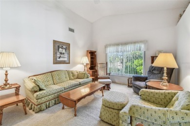 Stunning End-Unit Condo with Pond Views in a Vibrant 55+ on On Top Of The World Golf Course in Florida - for sale on GolfHomes.com, golf home, golf lot