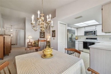 Stunning End-Unit Condo with Pond Views in a Vibrant 55+ on On Top Of The World Golf Course in Florida - for sale on GolfHomes.com, golf home, golf lot