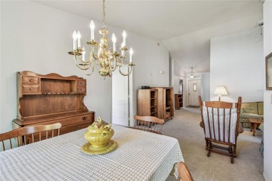 Stunning End-Unit Condo with Pond Views in a Vibrant 55+ on On Top Of The World Golf Course in Florida - for sale on GolfHomes.com, golf home, golf lot