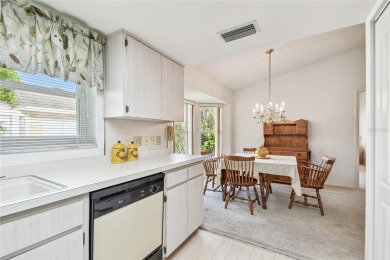 Stunning End-Unit Condo with Pond Views in a Vibrant 55+ on On Top Of The World Golf Course in Florida - for sale on GolfHomes.com, golf home, golf lot