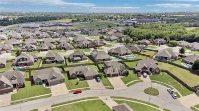 Discover this custom built, two story home offering 5 bedrooms on Forest Ridge Golf Club in Oklahoma - for sale on GolfHomes.com, golf home, golf lot