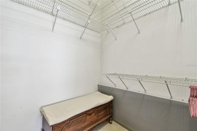 Stunning End-Unit Condo with Pond Views in a Vibrant 55+ on On Top Of The World Golf Course in Florida - for sale on GolfHomes.com, golf home, golf lot