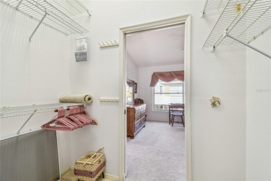 Stunning End-Unit Condo with Pond Views in a Vibrant 55+ on On Top Of The World Golf Course in Florida - for sale on GolfHomes.com, golf home, golf lot