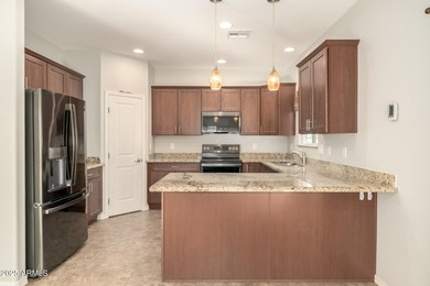 Experience sophisticated active-adult living in this like-new on Apache Wells Country Club in Arizona - for sale on GolfHomes.com, golf home, golf lot