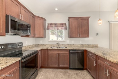 Experience sophisticated active-adult living in this like-new on Apache Wells Country Club in Arizona - for sale on GolfHomes.com, golf home, golf lot