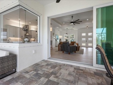 Brand new, 3/2 /3 pool home on desired canal lot.  Located in a on Pinemoor West Golf Club in Florida - for sale on GolfHomes.com, golf home, golf lot