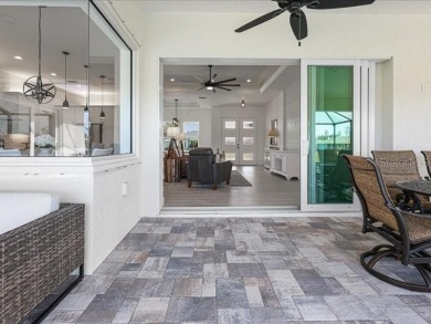 Brand new, 3/2 /3 pool home on desired canal lot.  Located in a on Pinemoor West Golf Club in Florida - for sale on GolfHomes.com, golf home, golf lot