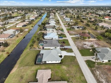 Brand new, 3/2 /3 pool home on desired canal lot.  Located in a on Pinemoor West Golf Club in Florida - for sale on GolfHomes.com, golf home, golf lot