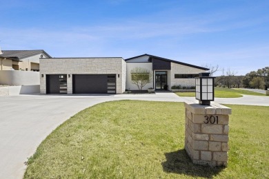 Beautiful contemporary home that sits on an unbelievable half on Ram Rock Golf Course in Texas - for sale on GolfHomes.com, golf home, golf lot