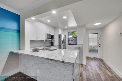 Totally remodeled 2/2 condo from top to bottom in Sunrise Lakes on Sunrise Lakes Phase IV Golf Course in Florida - for sale on GolfHomes.com, golf home, golf lot