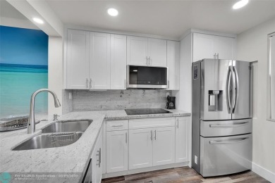Totally remodeled 2/2 condo from top to bottom in Sunrise Lakes on Sunrise Lakes Phase IV Golf Course in Florida - for sale on GolfHomes.com, golf home, golf lot
