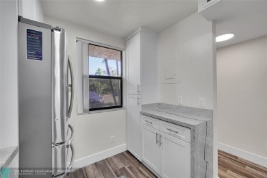 Totally remodeled 2/2 condo from top to bottom in Sunrise Lakes on Sunrise Lakes Phase IV Golf Course in Florida - for sale on GolfHomes.com, golf home, golf lot