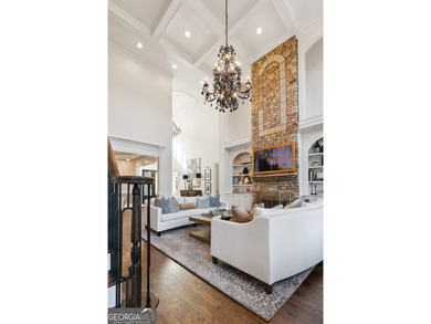 Privately tucked behind a long, tree-lined driveway and greeted on Chateau Elan Golf Club  in Georgia - for sale on GolfHomes.com, golf home, golf lot