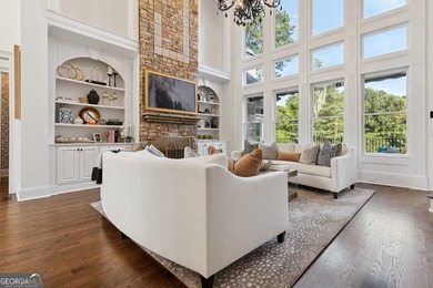 Privately tucked behind a long, tree-lined driveway and greeted on Chateau Elan Golf Club  in Georgia - for sale on GolfHomes.com, golf home, golf lot