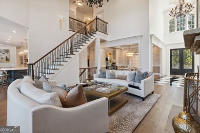 Privately tucked behind a long, tree-lined driveway and greeted on Chateau Elan Golf Club  in Georgia - for sale on GolfHomes.com, golf home, golf lot