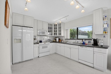 Baywood Driftwood Model 2 story Town Home with golf course and on Boca West Golf and Country Club in Florida - for sale on GolfHomes.com, golf home, golf lot