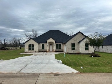 Gorgeous new home in the newest part of Pecan Plantation!  This on Pecan Plantation Country Club in Texas - for sale on GolfHomes.com, golf home, golf lot