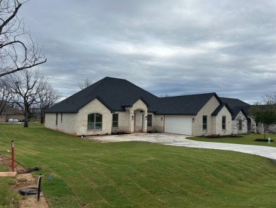 Gorgeous new home in the newest part of Pecan Plantation!  This on Pecan Plantation Country Club in Texas - for sale on GolfHomes.com, golf home, golf lot