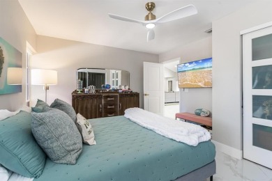 Located on a corner lot in PGA, this updated 3BR/3BA home offers on PGA National Golf Club in Florida - for sale on GolfHomes.com, golf home, golf lot