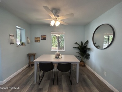 Welcome to this charming 2-bedroom, 2-bathroom coastal condo on Carolina Shores Golf Course in North Carolina - for sale on GolfHomes.com, golf home, golf lot