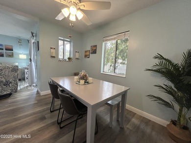 Welcome to this charming 2-bedroom, 2-bathroom coastal condo on Carolina Shores Golf Course in North Carolina - for sale on GolfHomes.com, golf home, golf lot