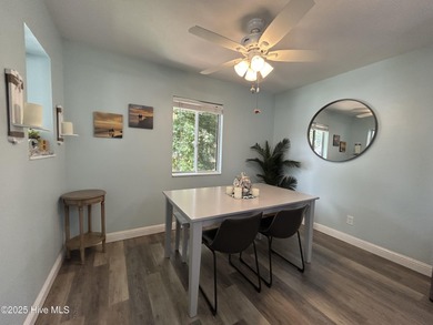 Welcome to this charming 2-bedroom, 2-bathroom coastal condo on Carolina Shores Golf Course in North Carolina - for sale on GolfHomes.com, golf home, golf lot