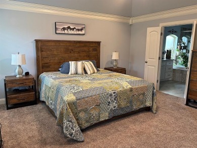 This exquisite four bedroom three bath Al Couto home boasts on Harbor Lakes Golf Club in Texas - for sale on GolfHomes.com, golf home, golf lot