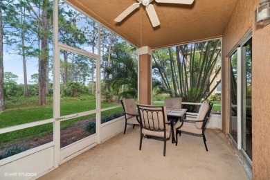 First floor corner unit with lake, golf and preserve views. Very on The Legacy Golf and Tennis Club in Florida - for sale on GolfHomes.com, golf home, golf lot