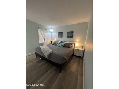 Welcome to this charming 2-bedroom, 2-bathroom coastal condo on Carolina Shores Golf Course in North Carolina - for sale on GolfHomes.com, golf home, golf lot