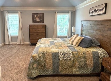 This exquisite four bedroom three bath Al Couto home boasts on Harbor Lakes Golf Club in Texas - for sale on GolfHomes.com, golf home, golf lot