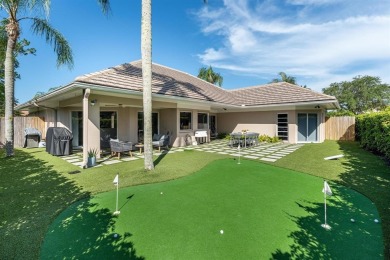 Located on a corner lot in PGA, this updated 3BR/3BA home offers on PGA National Golf Club in Florida - for sale on GolfHomes.com, golf home, golf lot