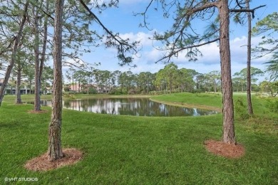 First floor corner unit with lake, golf and preserve views. Very on The Legacy Golf and Tennis Club in Florida - for sale on GolfHomes.com, golf home, golf lot