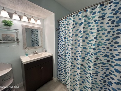 Welcome to this charming 2-bedroom, 2-bathroom coastal condo on Carolina Shores Golf Course in North Carolina - for sale on GolfHomes.com, golf home, golf lot