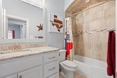 This exquisite four bedroom three bath Al Couto home boasts on Harbor Lakes Golf Club in Texas - for sale on GolfHomes.com, golf home, golf lot