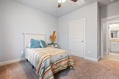 This exquisite four bedroom three bath Al Couto home boasts on Harbor Lakes Golf Club in Texas - for sale on GolfHomes.com, golf home, golf lot