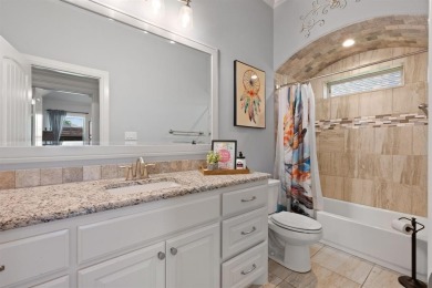 This exquisite four bedroom three bath Al Couto home boasts on Harbor Lakes Golf Club in Texas - for sale on GolfHomes.com, golf home, golf lot