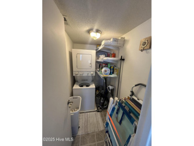Welcome to this charming 2-bedroom, 2-bathroom coastal condo on Carolina Shores Golf Course in North Carolina - for sale on GolfHomes.com, golf home, golf lot
