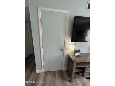 Welcome to this charming 2-bedroom, 2-bathroom coastal condo on Carolina Shores Golf Course in North Carolina - for sale on GolfHomes.com, golf home, golf lot