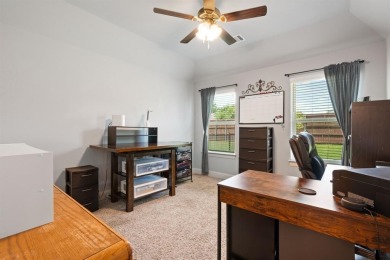 This exquisite four bedroom three bath Al Couto home boasts on Harbor Lakes Golf Club in Texas - for sale on GolfHomes.com, golf home, golf lot