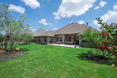 This exquisite four bedroom three bath Al Couto home boasts on Harbor Lakes Golf Club in Texas - for sale on GolfHomes.com, golf home, golf lot