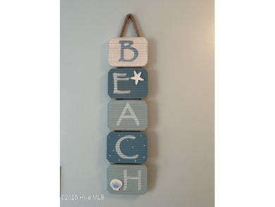 Welcome to this charming 2-bedroom, 2-bathroom coastal condo on Carolina Shores Golf Course in North Carolina - for sale on GolfHomes.com, golf home, golf lot