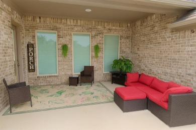 This exquisite four bedroom three bath Al Couto home boasts on Harbor Lakes Golf Club in Texas - for sale on GolfHomes.com, golf home, golf lot
