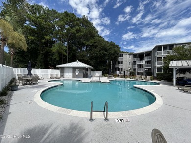 Welcome to this charming 2-bedroom, 2-bathroom coastal condo on Carolina Shores Golf Course in North Carolina - for sale on GolfHomes.com, golf home, golf lot