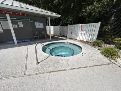 Welcome to this charming 2-bedroom, 2-bathroom coastal condo on Carolina Shores Golf Course in North Carolina - for sale on GolfHomes.com, golf home, golf lot